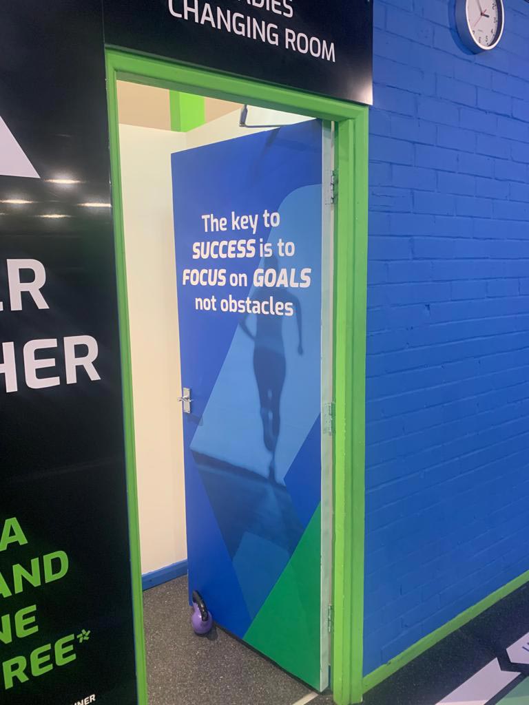 Environmental branding applied inside The Fitness Experts gym