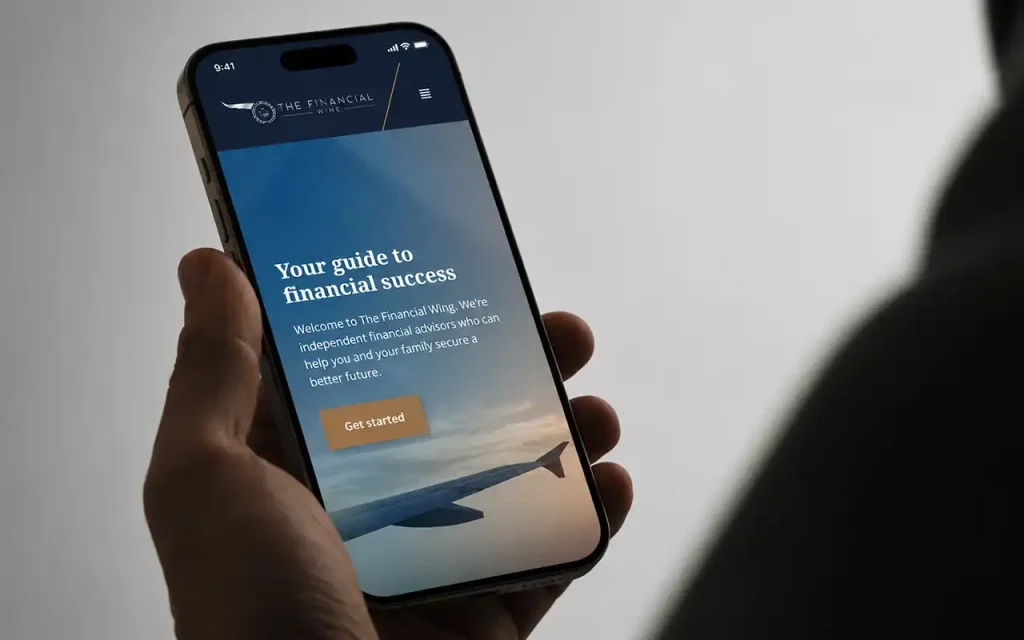 The Financial Wing homepage on a handheld smartphone, showing its financial advice introduction and Get started button.
